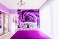 Interior of cozy bedroom in bright violet tones. Large mirrored Royalty Free Stock Photo