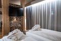 Interior of cozy bedroom at rustic style luxurious hotel Royalty Free Stock Photo