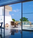 The interior of a cozy dining room on the terrace with sea views