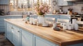 Interior of cozy vintage country style kitchen with kitchen island. Wooden countertops, light blue facades, various Royalty Free Stock Photo