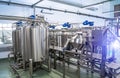 Interior of dairy factory with fermentation tank. Technology equipment at dairy farm. Sterile production. Royalty Free Stock Photo