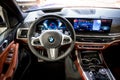 Interior dashboard drivers seat view BMW X7 M60i xDrive (G07) car Royalty Free Stock Photo