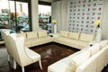 Interior decor at a cocktail party event with white sofas
