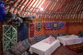 Interior decoration of the traditional national Kyrgyz yurt with tables for guests