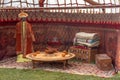 Interior decoration of a traditional nomad house yurt - a chest, pillows and blankets, felt carpets, national clothes Royalty Free Stock Photo