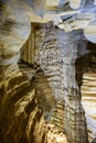 Interior of a deep cave with its columns and rock formations Royalty Free Stock Photo