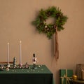 Interior design of Christmas dinning room interior with table, christmas wearth,