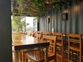 Interior design coffee shop. Empty Wooden seats in the cafe