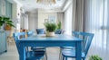 Interior design of dining room with a blue table and chairs in modern and bright flat. AI Generative Royalty Free Stock Photo