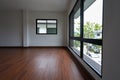 Interior design empty white room with glass window and wooden laminate floor