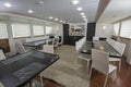 Interior of large salon dining area of luxury motor yacht Royalty Free Stock Photo