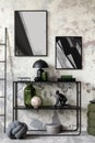 Interior design of indiustral living room with mock up poster frame, simple rack, gray concrete wall, braided pillow, lamp,