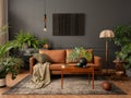 Interior design of living room interior with mock up poster frame, brown sofa, plants, wooden coffee table, lamp, ball, stylish Royalty Free Stock Photo