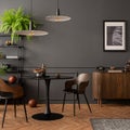 Interior design of living room interior with mock up poster frame, round black coffee table, wooden sideboard, stylish chair, Royalty Free Stock Photo