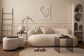 Interior design of living room interior with mock up poster frame, white sofa, modern pouf, glass coffee table, vase with branch,