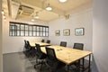Interior design of meeting rooms with tables and benches