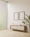 Minimal Japanese living room style with wood cabinet, frames mockup on white wall Royalty Free Stock Photo