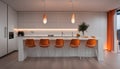 Interior design of minimalist kitchen integrated with dining area with orange lights at night Royalty Free Stock Photo