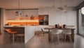 Interior design of minimalist kitchen integrated with dining area with orange lights at night Royalty Free Stock Photo
