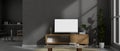 Modern loft living room with TV screen mockup stand on wooden TV cabinet against the grey wall Royalty Free Stock Photo