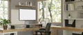 Interior design of a modern minimalist home office with a computer mockup on a wooden desk Royalty Free Stock Photo