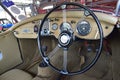 Interior design of Morris Garage old classic sports car in beige colour