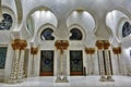 The interior design of the mosque. The floor and walls are white marble, elegant arches.