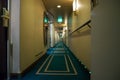 Passenger deck hallway with living cabins rooms on board of cruise ship Royalty Free Stock Photo