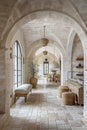 interior design photo of an architectural of a well maintained and luminous Tuscan house in white stone texture and with luxury