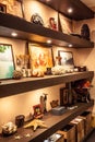 Interior design shelves with travel souvenirs and accessories in nautical vintage style with illumination
