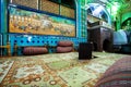 Interior design of traditional iranian restaurant with ottoman couches