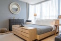Interior design of villa, house, home, condo and apartment feature bedroom, king size bed, and grey wall Royalty Free Stock Photo