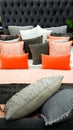 Interior designed bedroom furnishings in orange and grays