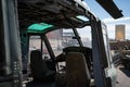 Interior of an abandoned BELL UH-1C helicopter in the city Royalty Free Stock Photo