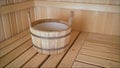 Interior details Finnish sauna steam room with traditional sauna accessories basin scoop. Traditional old Russian bathhouse SPA