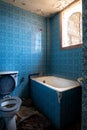 Interior of a dirty empty demolished abandoned bathroom Royalty Free Stock Photo