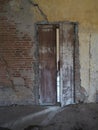 Blurred The old industrial door in abandoned building. Royalty Free Stock Photo