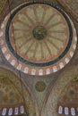 Interior dome of a mosque with intricate patterns and stained glass windows, Istanbul, Turkey. Royalty Free Stock Photo