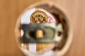 Interior door lock latch at stage of doorknob installation