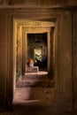 Interior doorway at Ta Prohm temple ruins, located in Angkor Wat complex near Siem Reap, Cambodia. Royalty Free Stock Photo