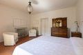 Interior of a double bedroom in a rustic and country style. We are in Italy