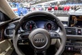 Interior driver dashboard view in the Audi A7 car at the Brussels Expo Autosalon motor show. Belgium - January 12, 2016