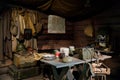 Interior of dugout Soviet soldiers during second world war, items of military life, reconstruction