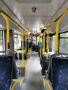 Interior of a electric city bus. Empty bus interior. Public transport in the city of Cluj Romania Royalty Free Stock Photo