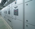 Interior of electrical room. Power energy motor machinery cabinets in control or server room, main operator station network and Royalty Free Stock Photo