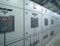 Interior of electrical room. Power energy motor machinery cabinets in control or server room, main operator station network and Royalty Free Stock Photo