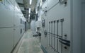 Interior of electrical room. Power energy motor machinery cabinets in control or server room, main operator station network and Royalty Free Stock Photo