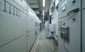 Interior of electrical room. Power energy motor machinery cabinets in control or server room, main operator station network and Royalty Free Stock Photo