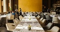Elegant Restaurant Interior with Set Tables and Waitstaff dining Royalty Free Stock Photo