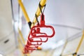 Interior elements of public transport - city bus grab handles - on a blurred background Royalty Free Stock Photo